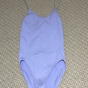 Purple out from under body suit